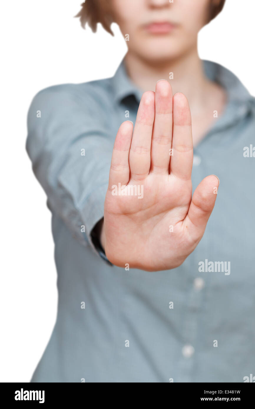 Il segnale di arresto - una mano gesto isolato su sfondo bianco Foto Stock