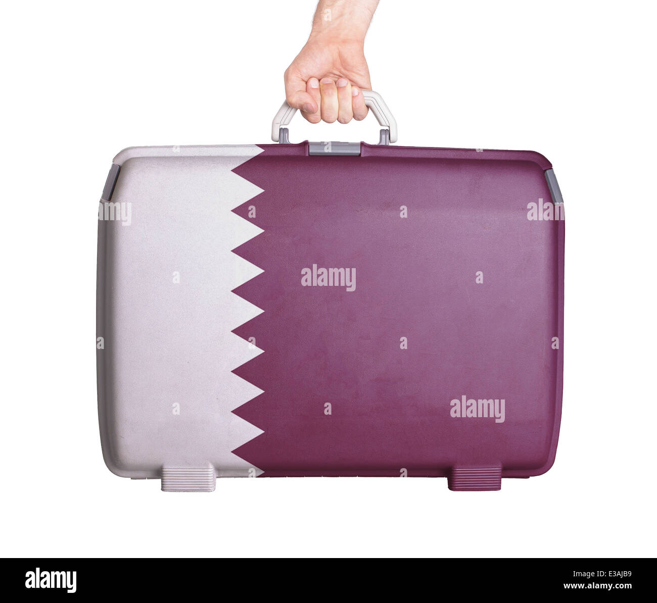 Utilizzate la valigia in plastica con macchie e graffi, stampato con bandiera, in Qatar Foto Stock