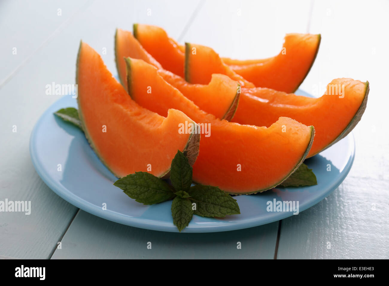 Il melone Cantalupo con la menta come ristoro sano, close up Foto Stock