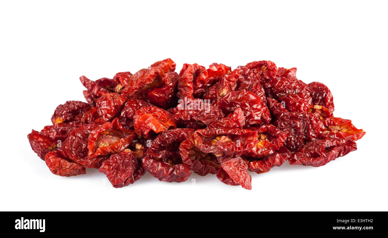 Pomodori secchi isolati su sfondo bianco. Foto Stock