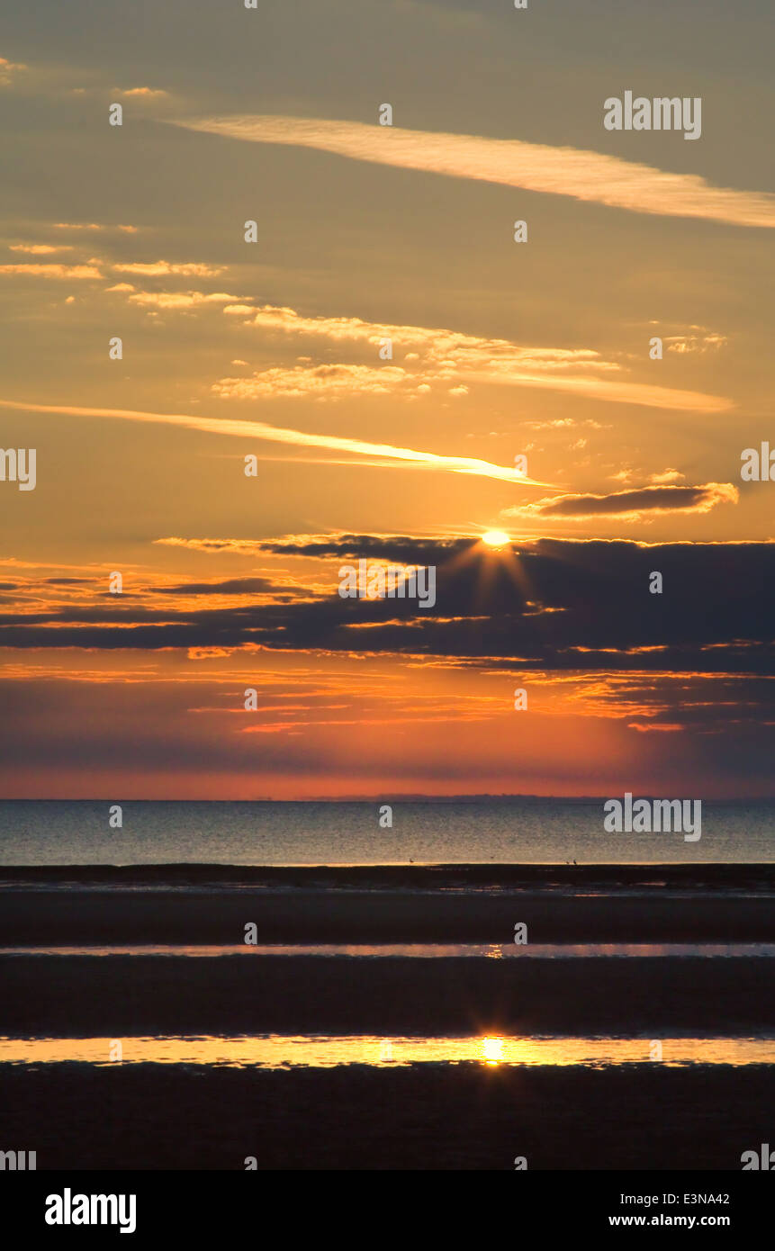 Il tramonto del lavaggio, Hunstanton, Norfolk Foto Stock