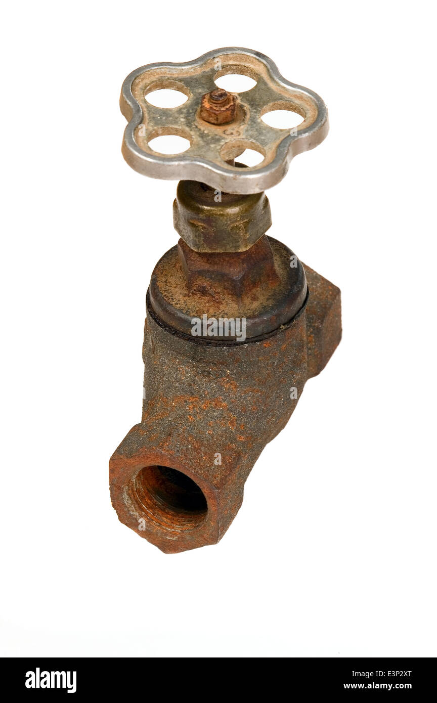 Vecchio arrugginito tubo marrone con gru industriali attrezzo idraulico Foto Stock