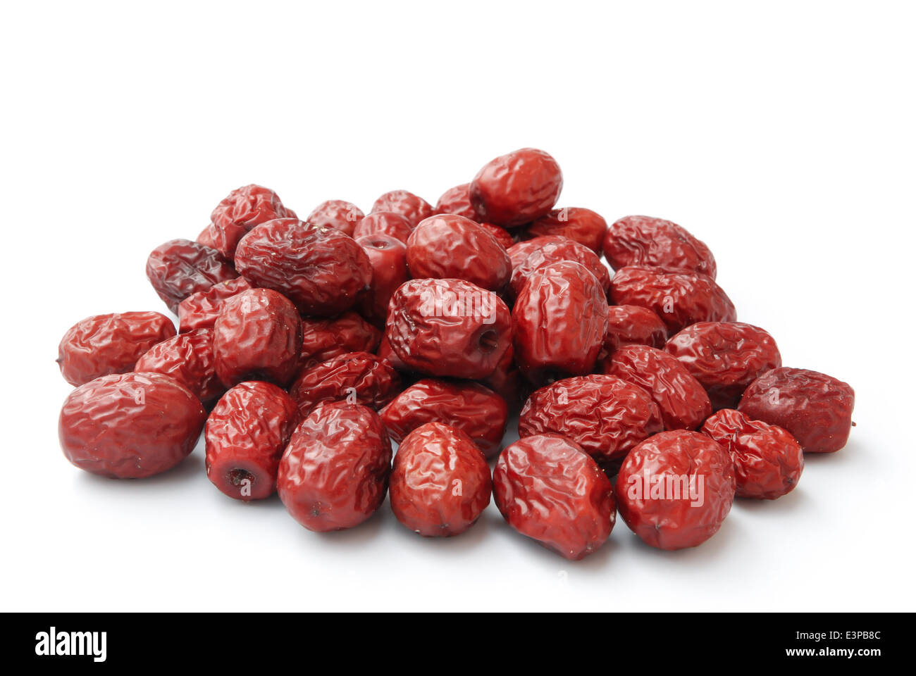 Jujube essiccato su bianco,cinese tradizionale a base di erbe Foto Stock