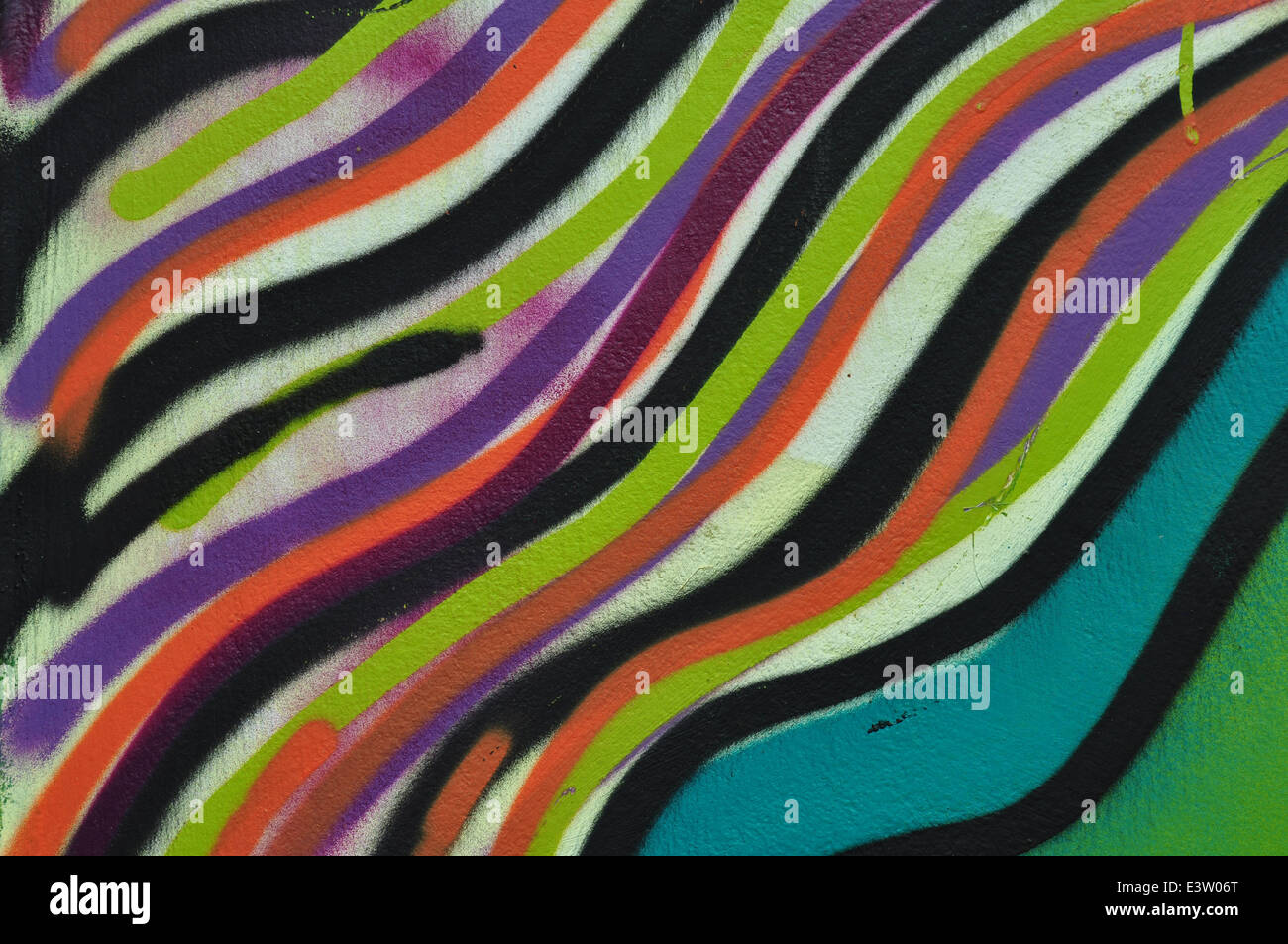 Abstract linee colorate pattern background artistico. Graffiti vernice spray sulla parete texture. Foto Stock
