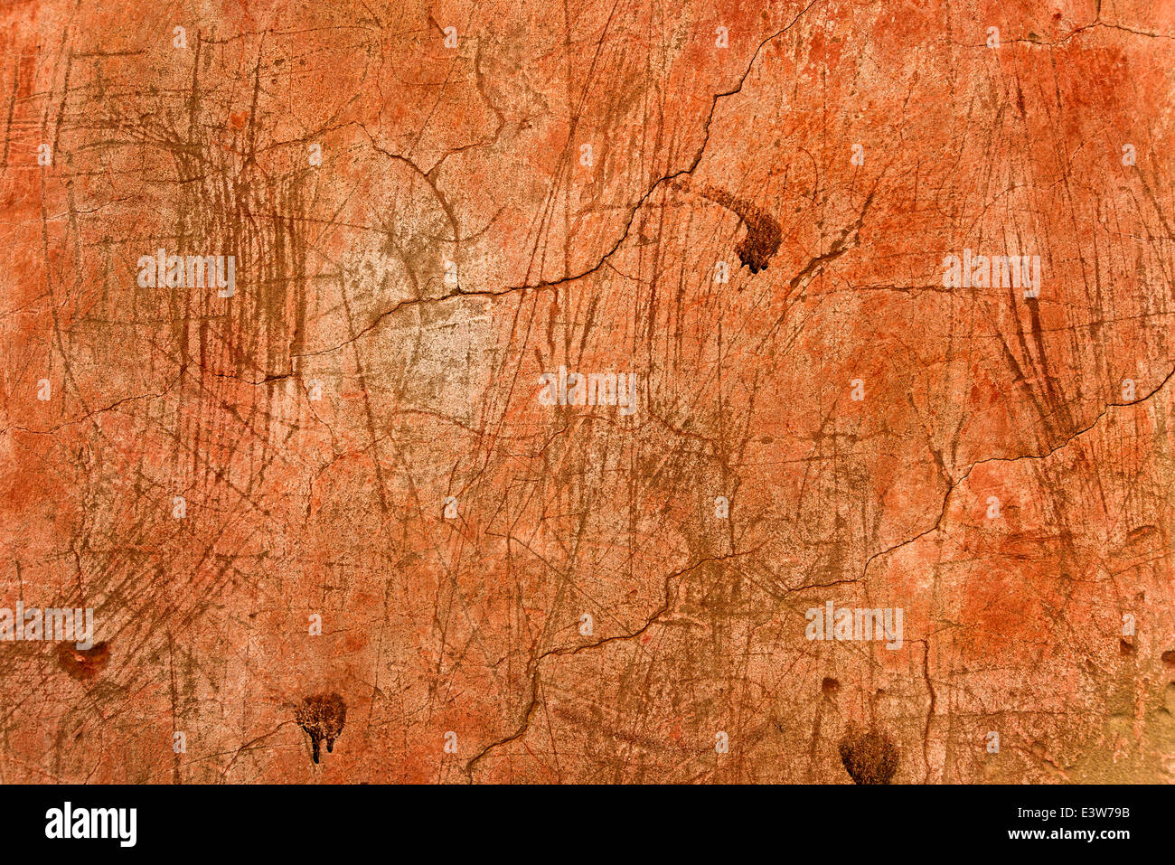 Grunge parete arancione la texture come background urbano e spazio di copia. Foto Stock
