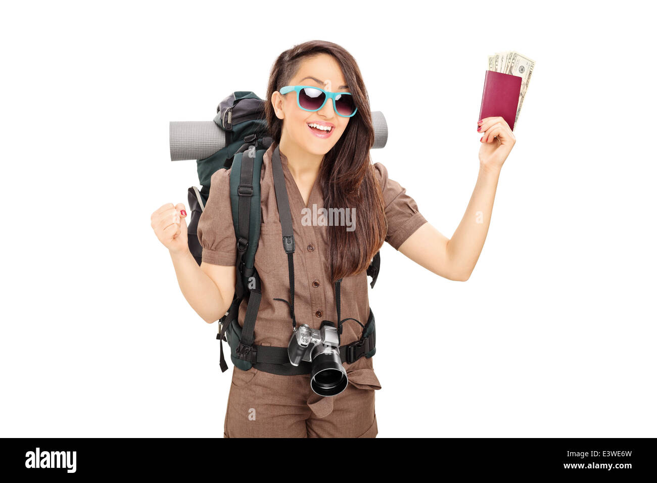 Felice femmina azienda turistica passaporto con denaro Foto Stock