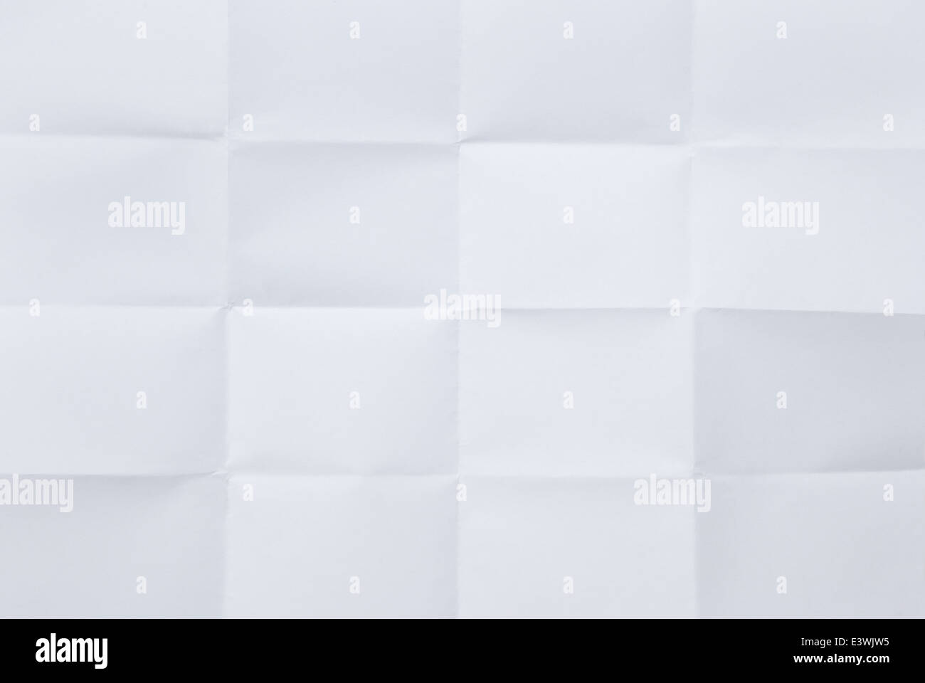 Foglio bianco di carta piegato in sedici Foto Stock