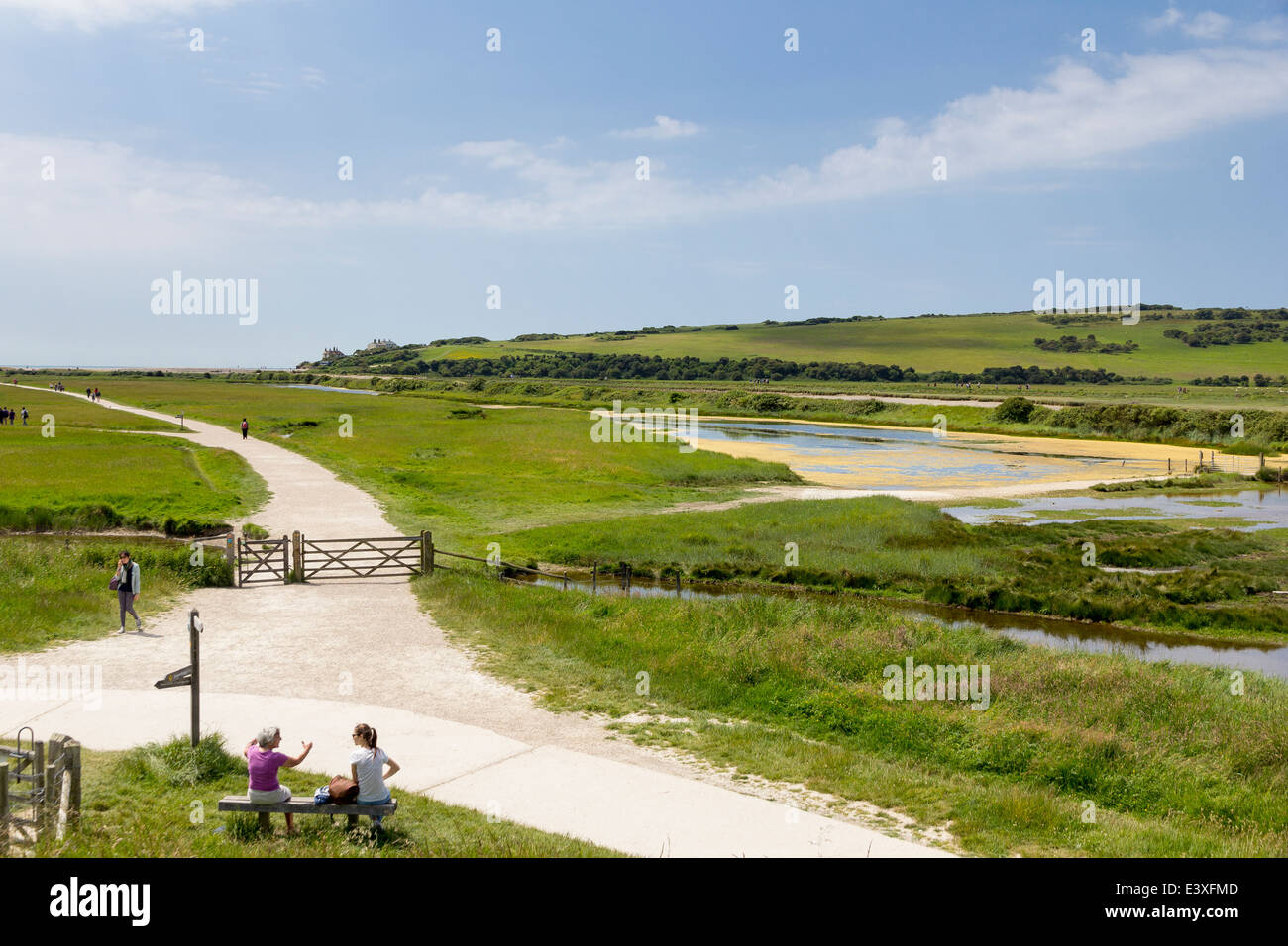 Il fiume Cuckmere a Cuckmere Haven, parte delle Sette sorelle Country Park Foto Stock