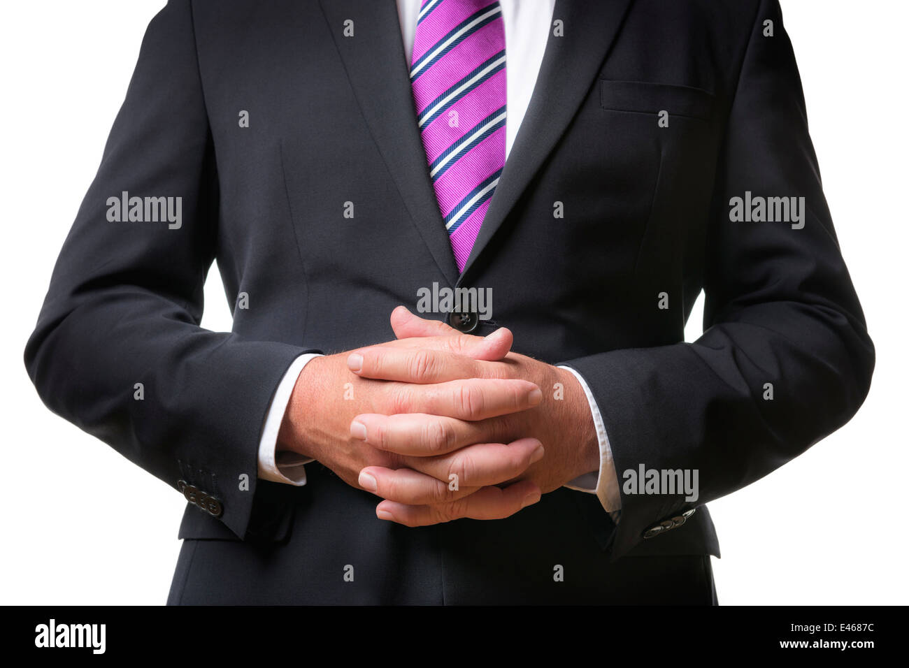 Le mani di una preghiera uomo d affari con abito scuro e cravatta Foto  stock - Alamy