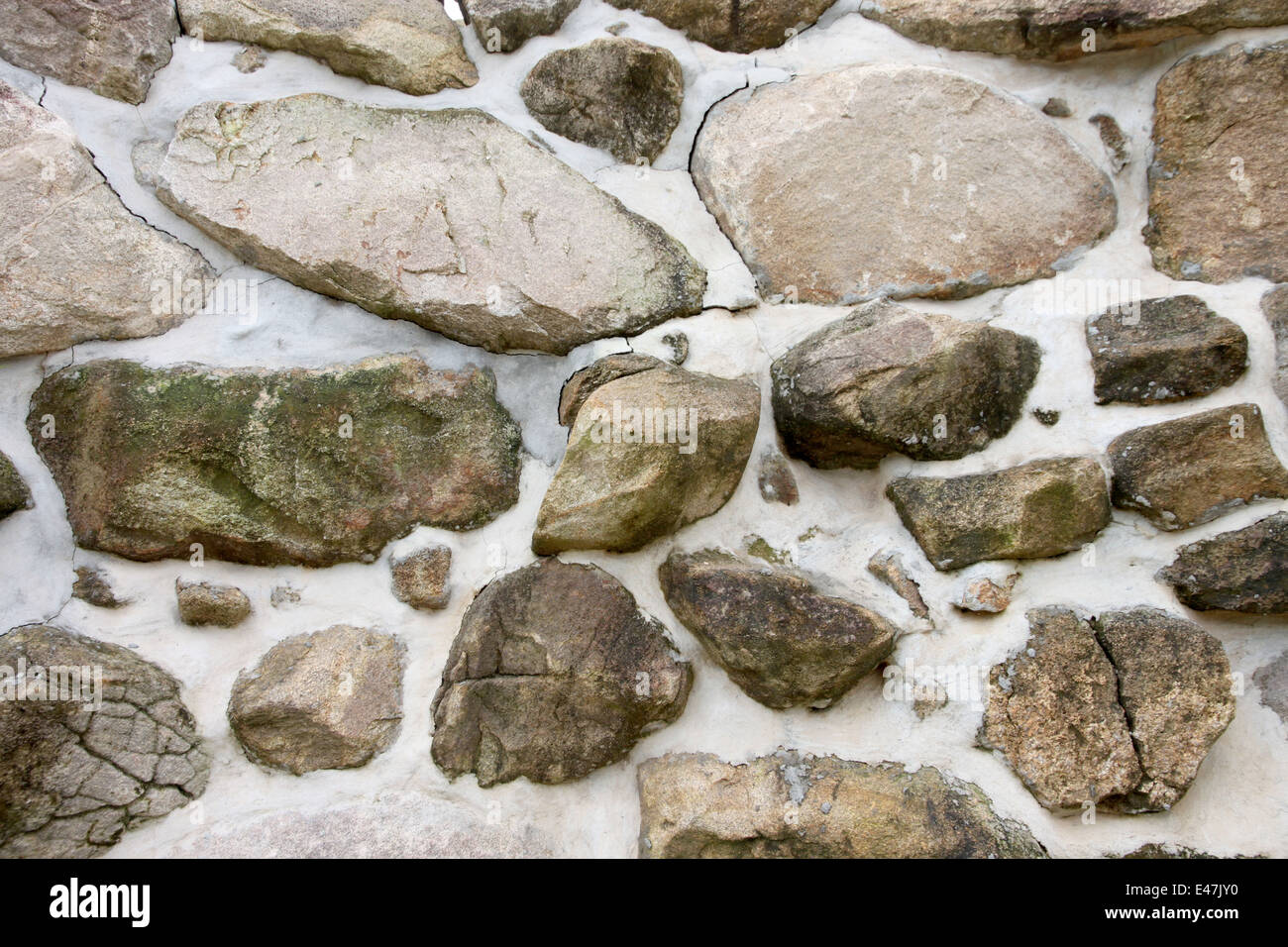 Il vecchio muro di pietra per lo sfondo Foto Stock