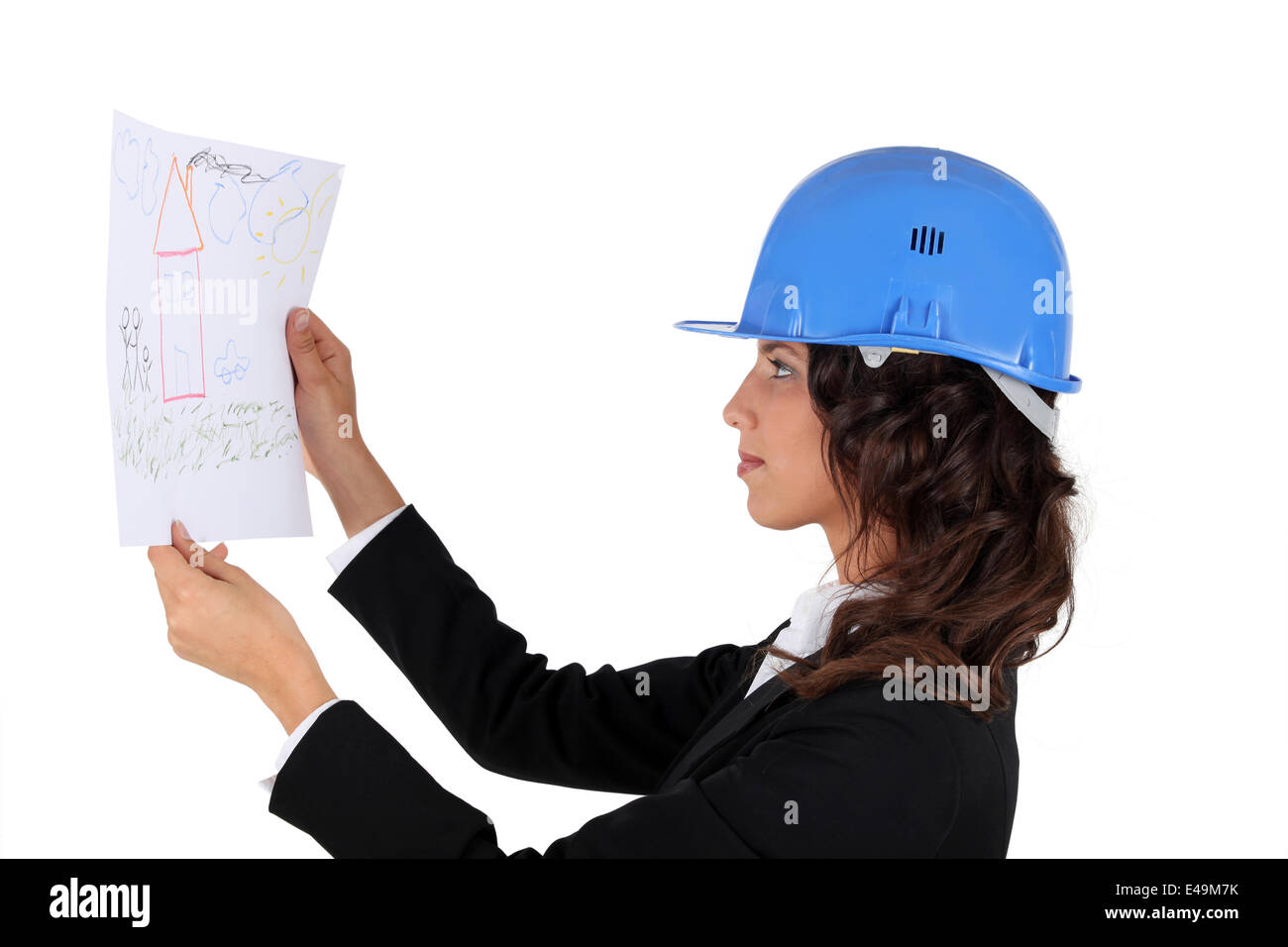 Un ingegnere di ispezionare il disegno Foto Stock