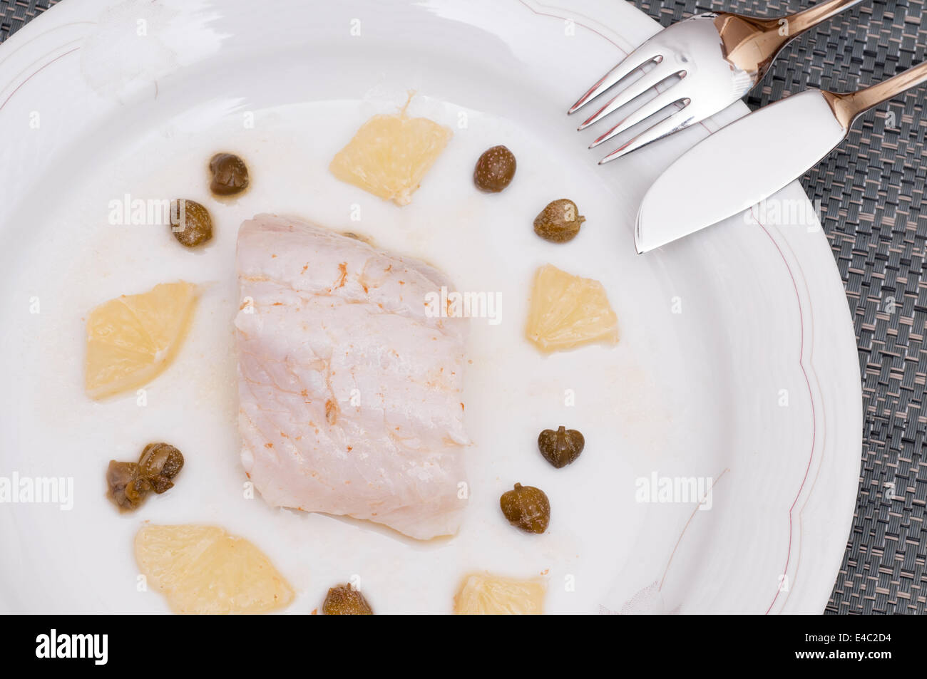 Zander con limone e capperi Foto Stock