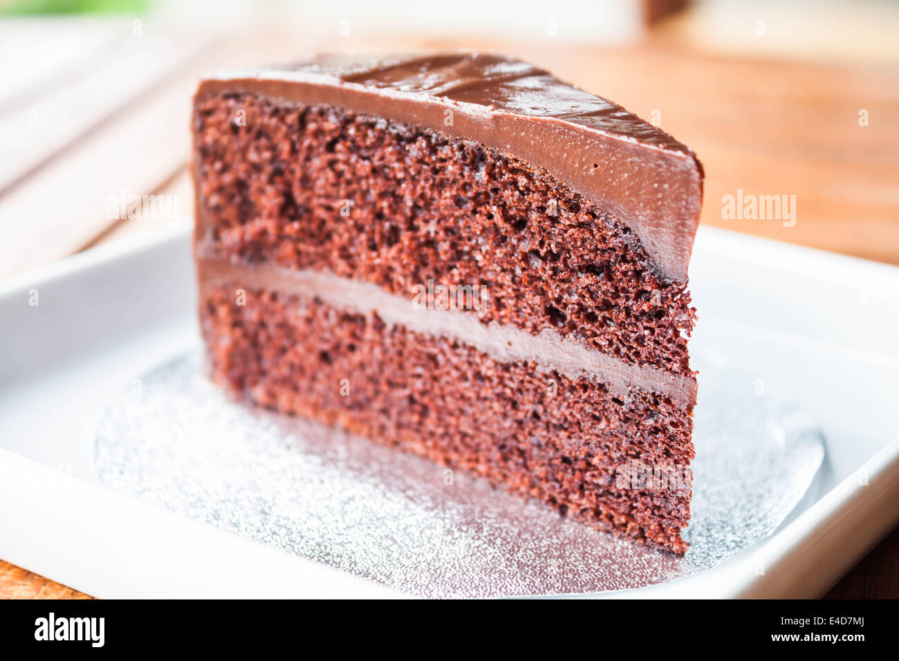 Parte di cioccolato pan di spagna da vicino Foto Stock