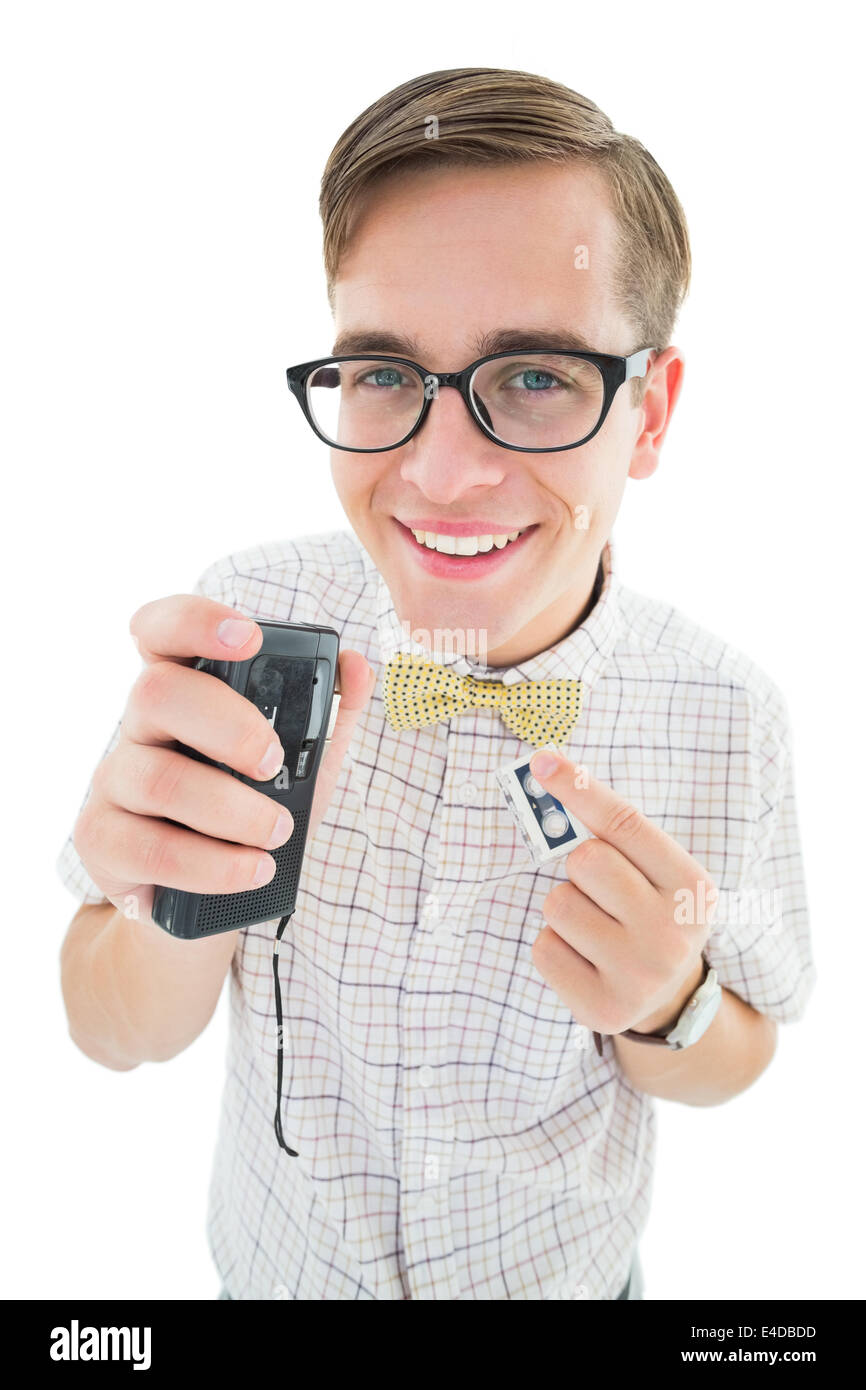 Geeky hipster parlando in dictaphone Foto Stock