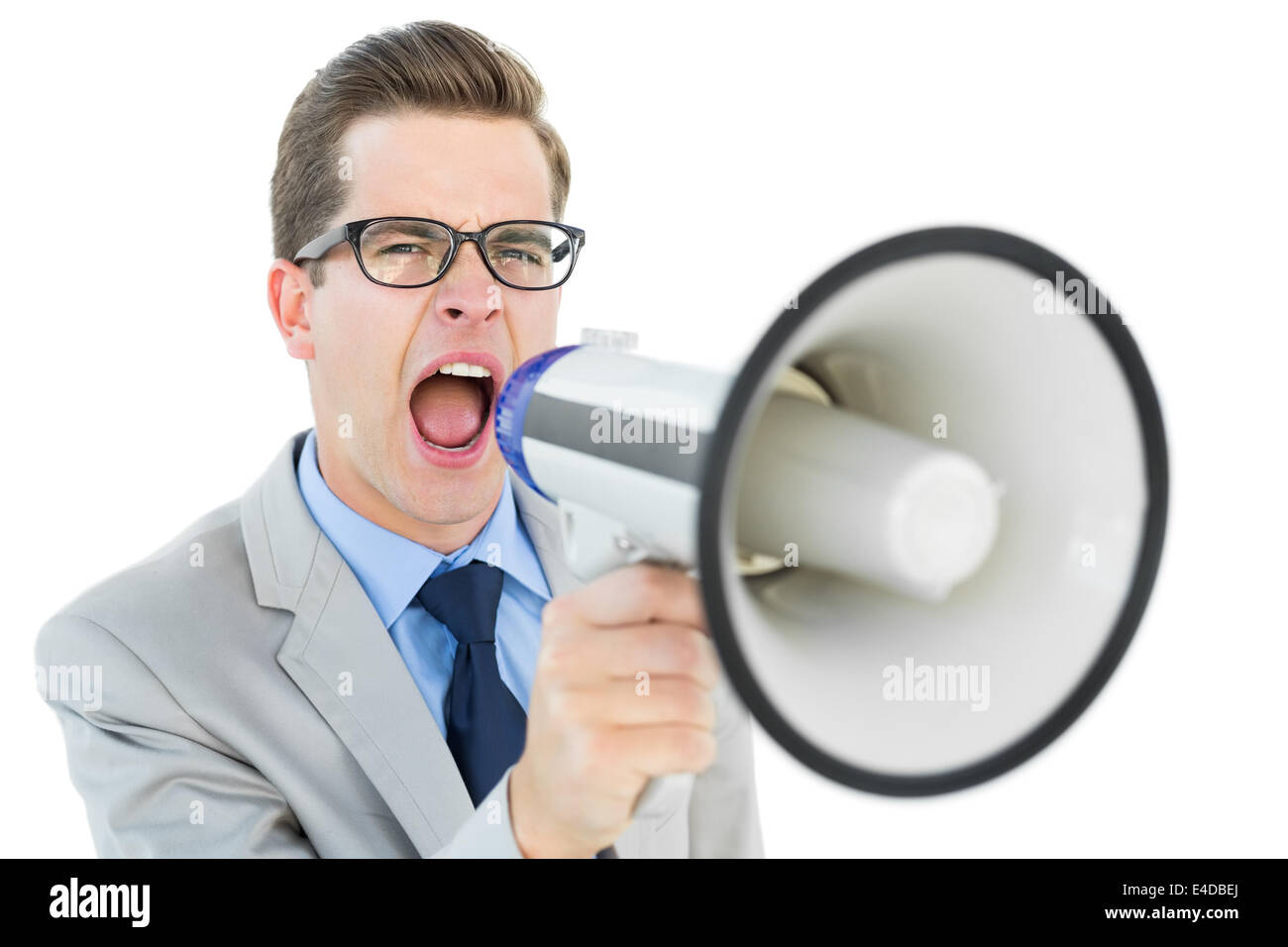 Geeky imprenditore urlando attraverso il megafono Foto Stock