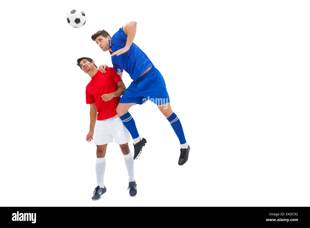 I giocatori di calcio affrontare per la sfera Foto Stock