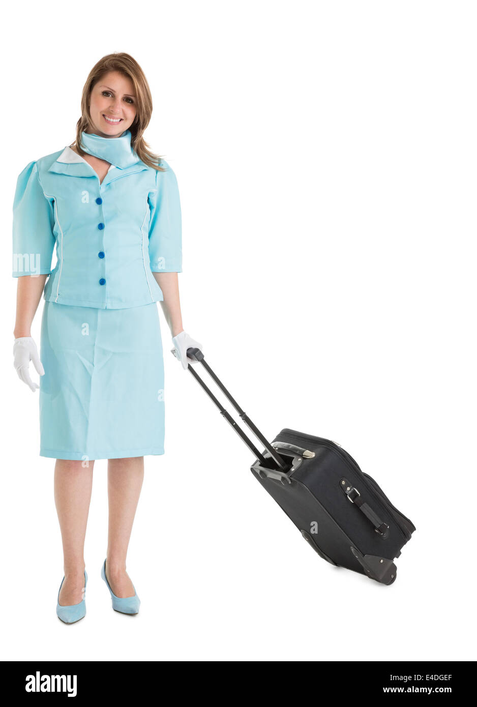 Ritratto di hostess in uniforme blu con la sua borsa Foto Stock