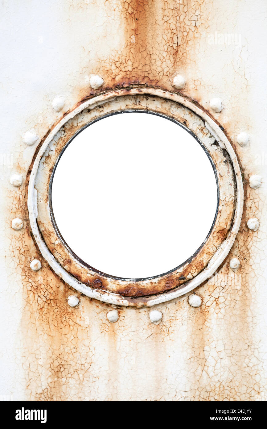 Svuotare round arrugginita oblò sul bianco parete della nave Foto Stock
