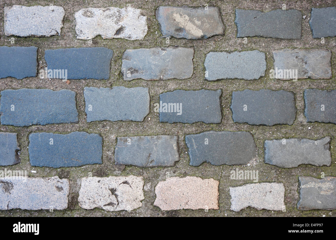 Sullo sfondo la parete in pietra lastricata di texture Foto Stock
