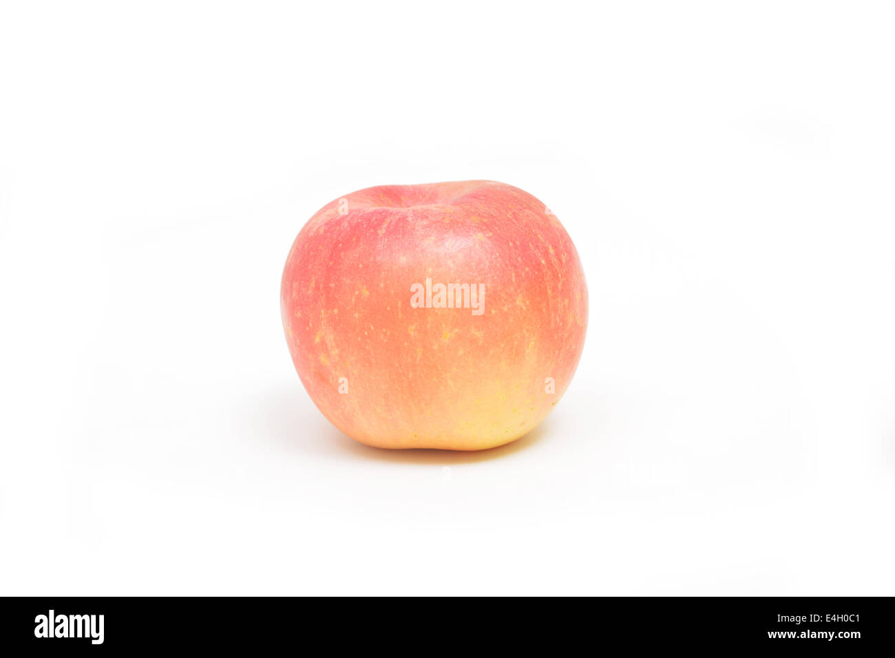 Un unico apple con il rosso e il colore arancione gradiation. Foto Stock