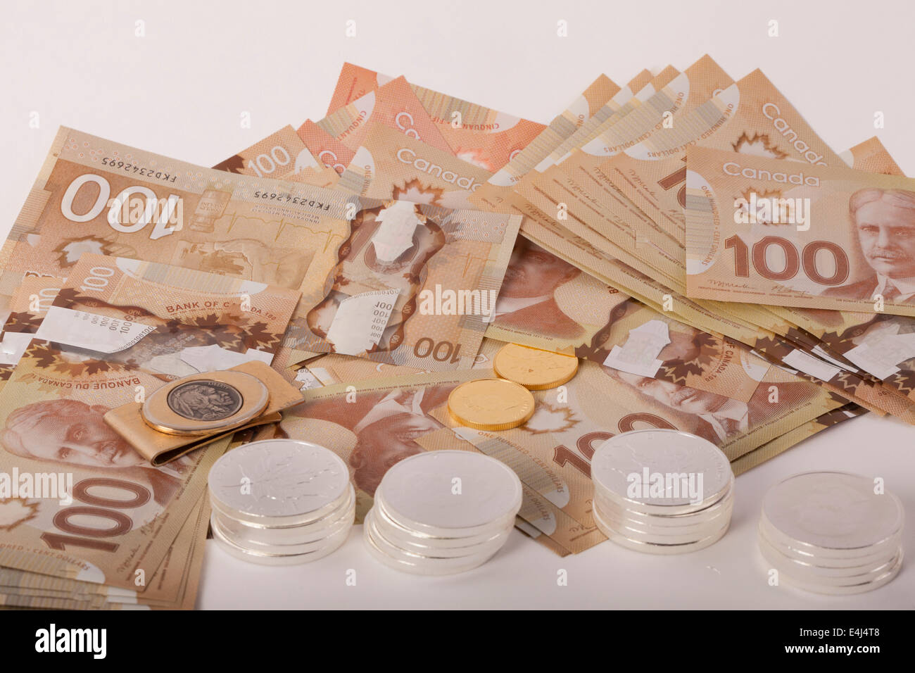 Valuta canadese 100 e 50 le fatture del dollaro con oro e argento moneta Foto Stock