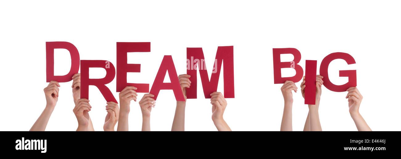 Molte mani tenendo le parole grande sogno, isolato Foto Stock