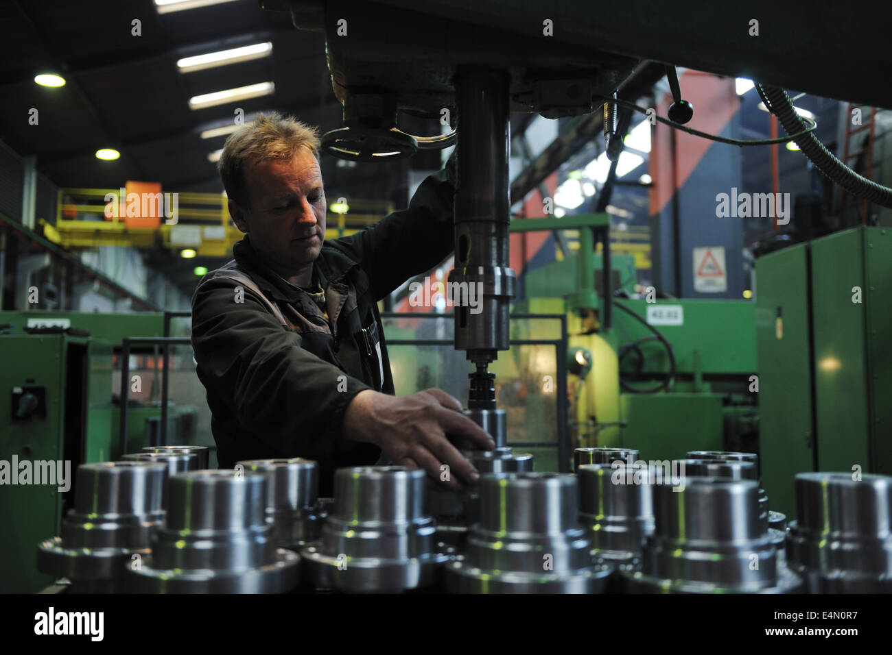 I lavoratori del settore persone in fabbrica Foto Stock