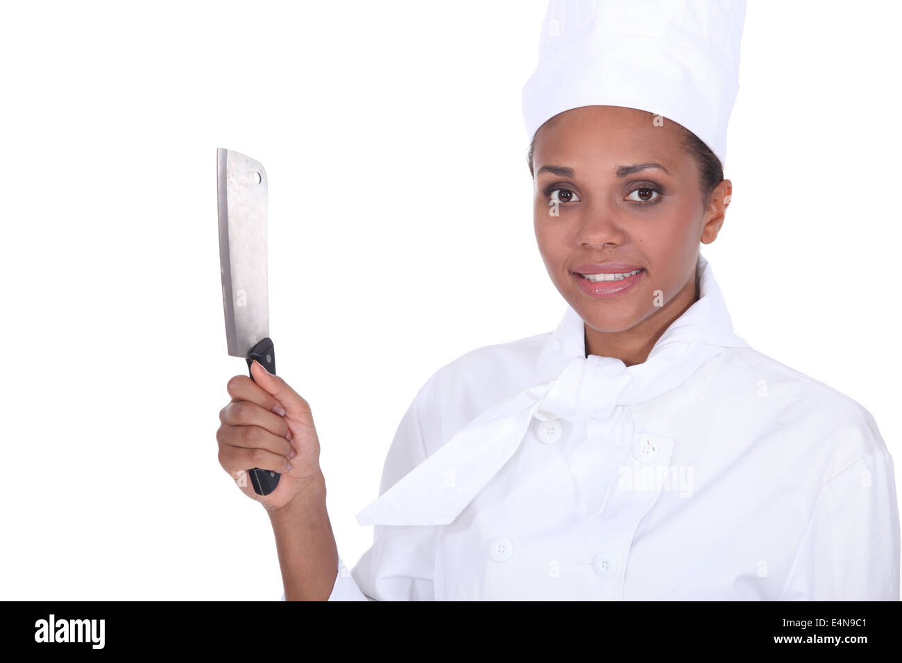 Lo chef tenendo un coltello da cucina Foto Stock