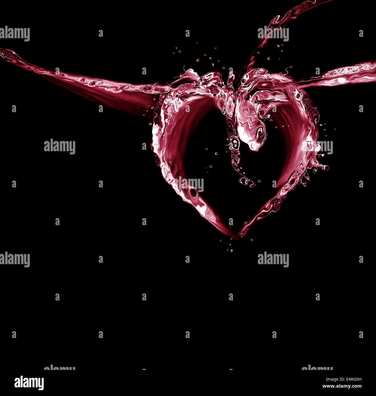 Un cuore fatto di liquido rosso su nero. Foto Stock