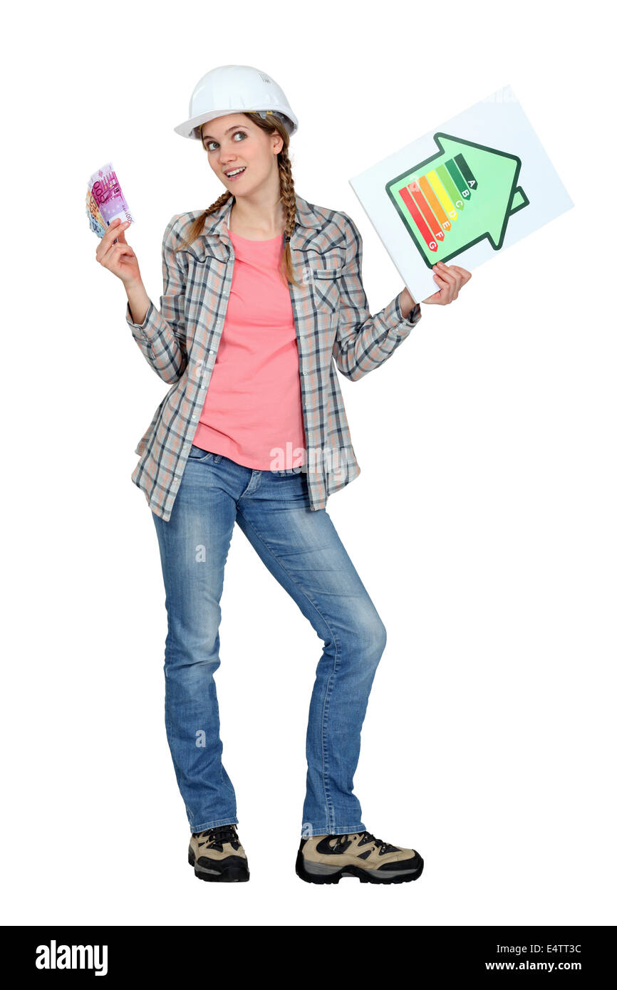 Tradeswoman azienda efficienza energetica grafico Foto Stock