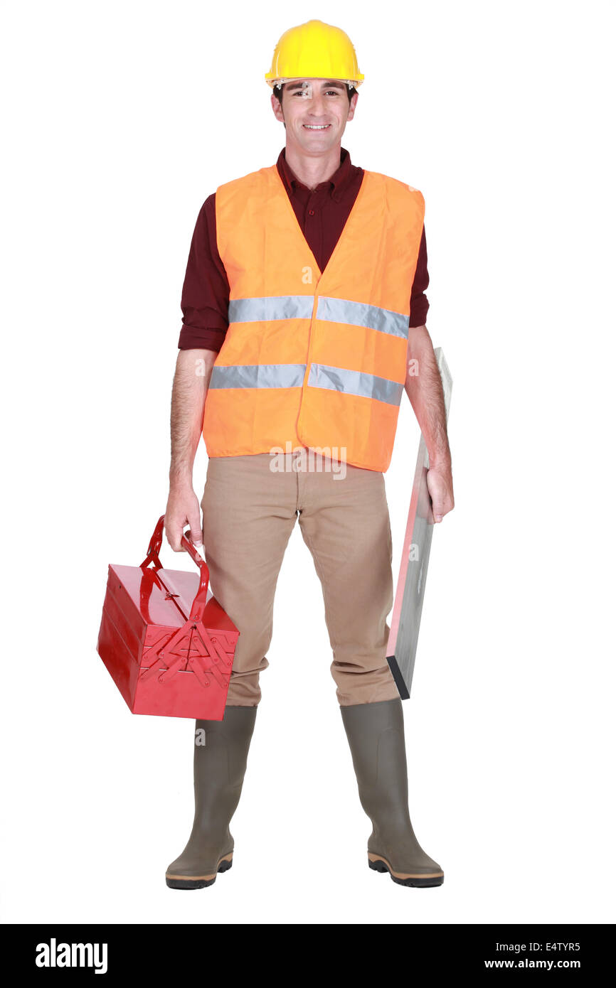 A tutta lunghezza Ritratto di uomo con il solo elemento cassetta degli attrezzi Foto Stock