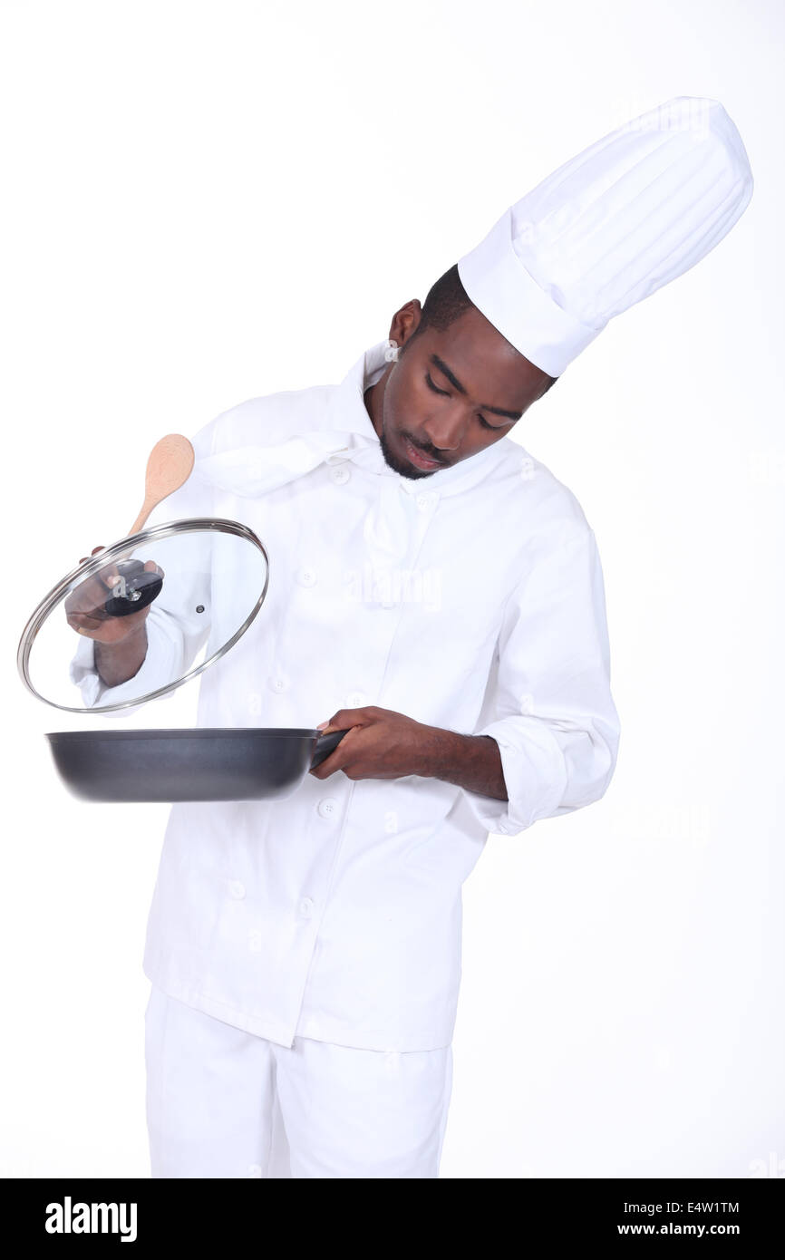 Il cuoco in cucina Foto Stock