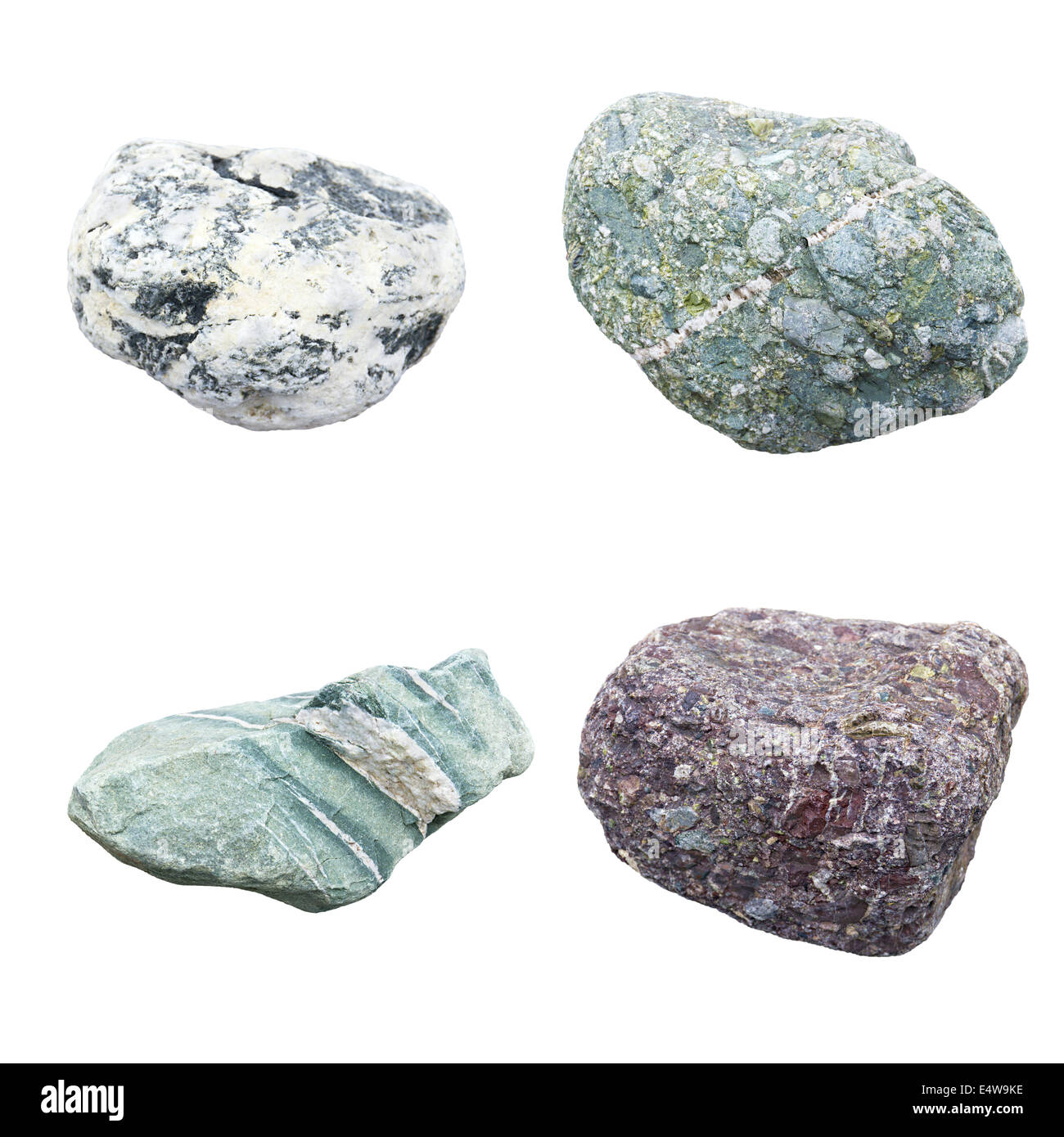 Set di quattro minerali su sfondo bianco Foto Stock