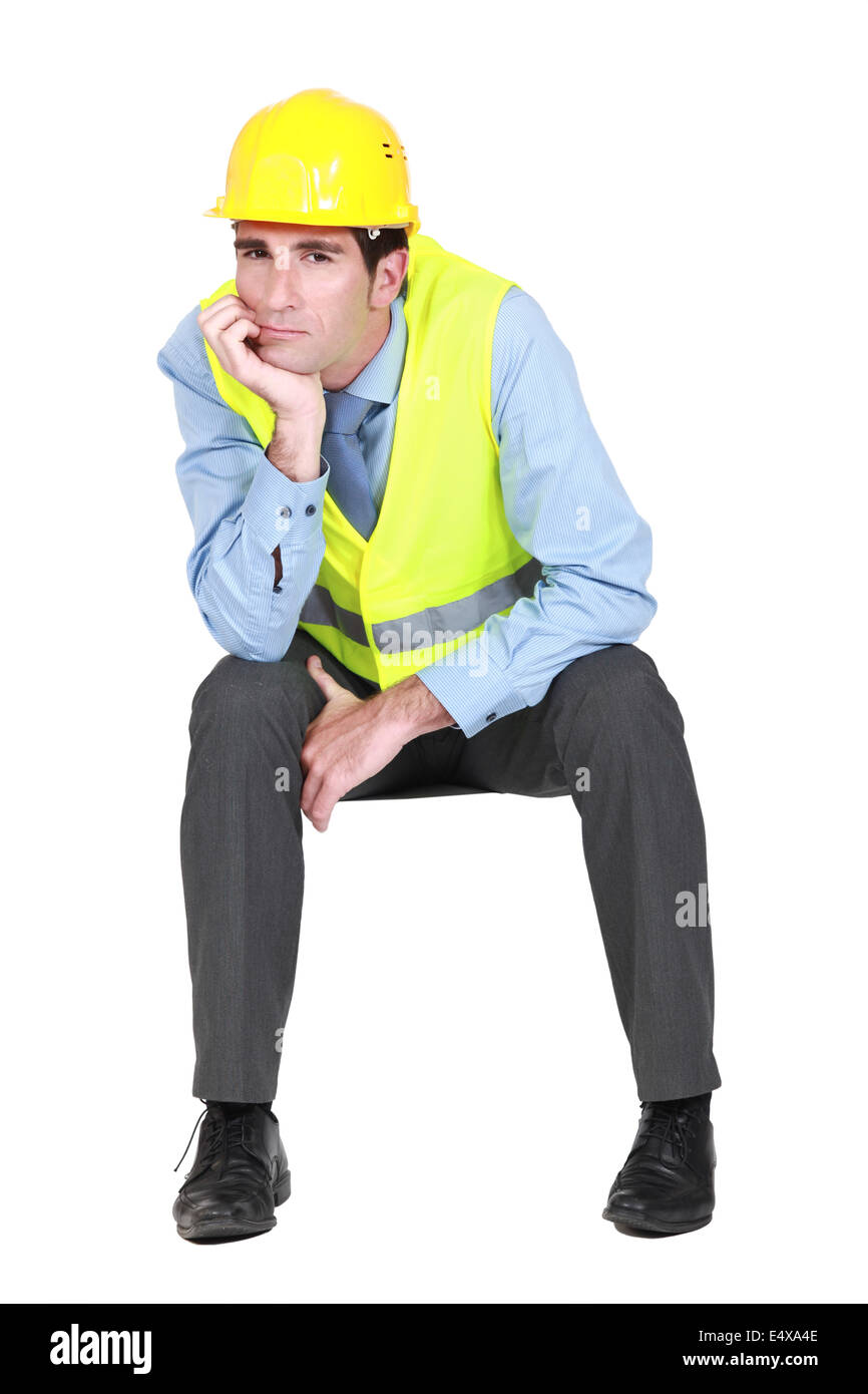 Annoiato ingegnere di lavoro on-site Foto Stock