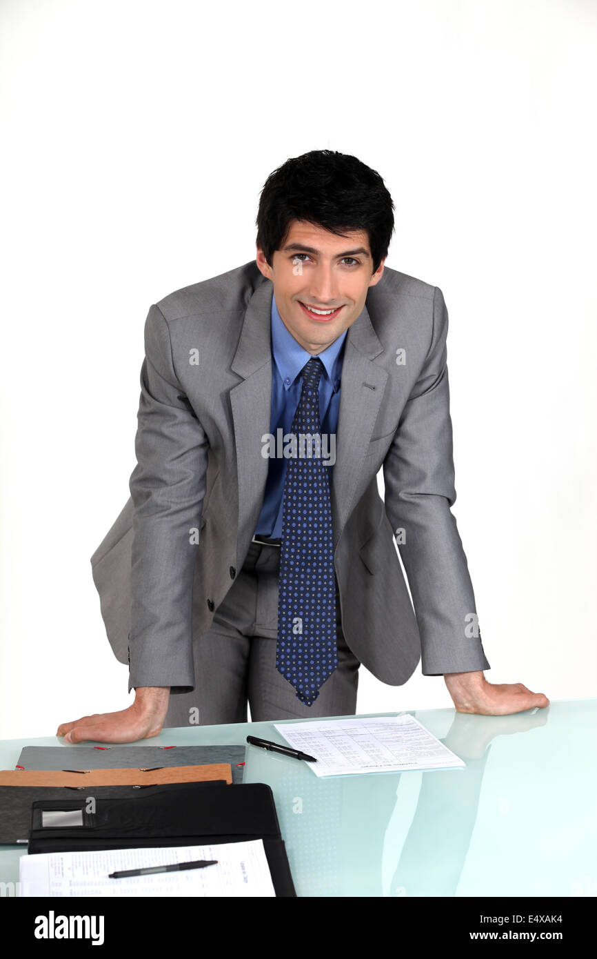 Executive mani appoggiate sul tavolo Foto Stock Executive mani appoggiate sul tavolo Foto Stock