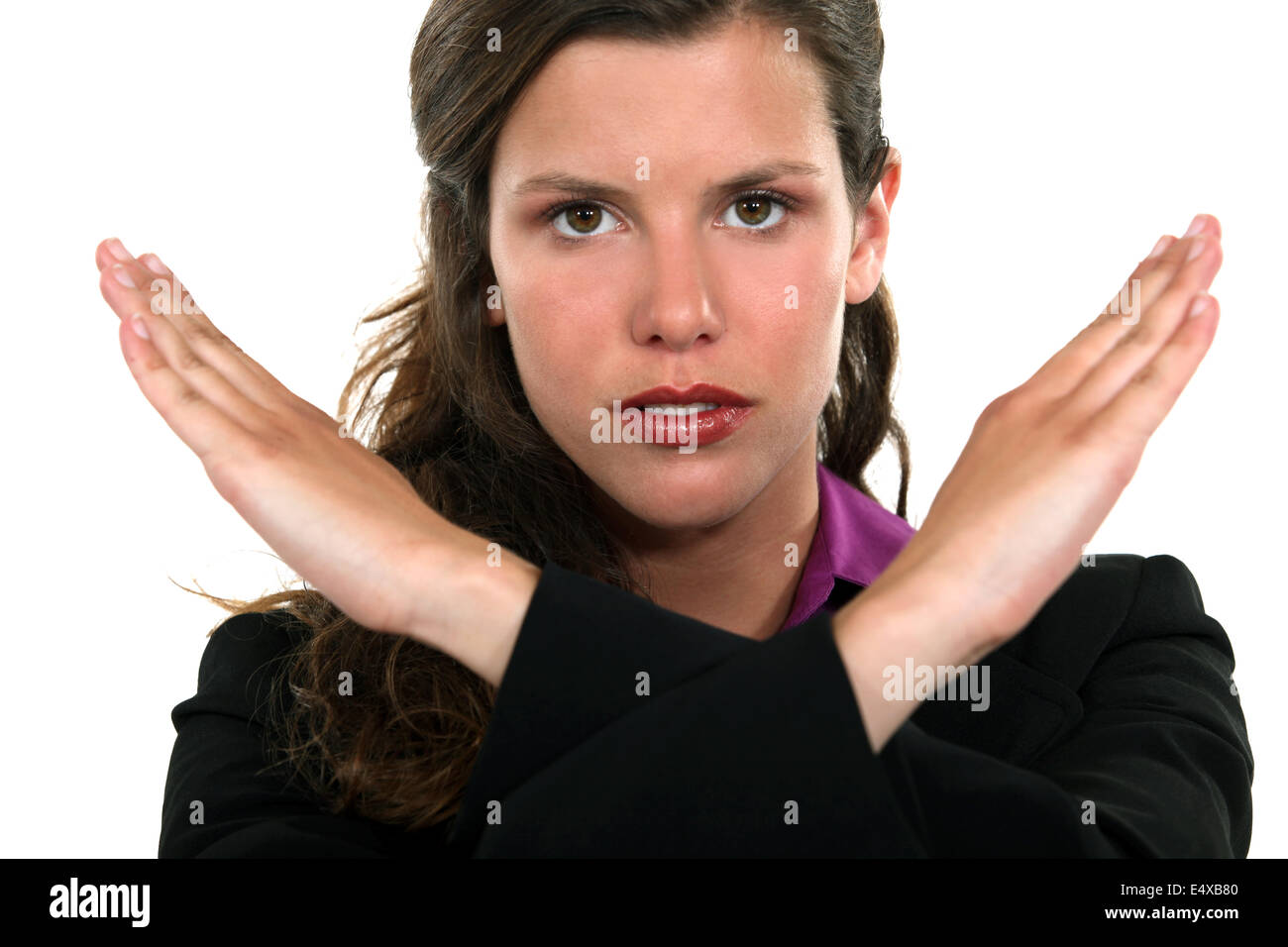 Donna con le mani incrociate Foto Stock