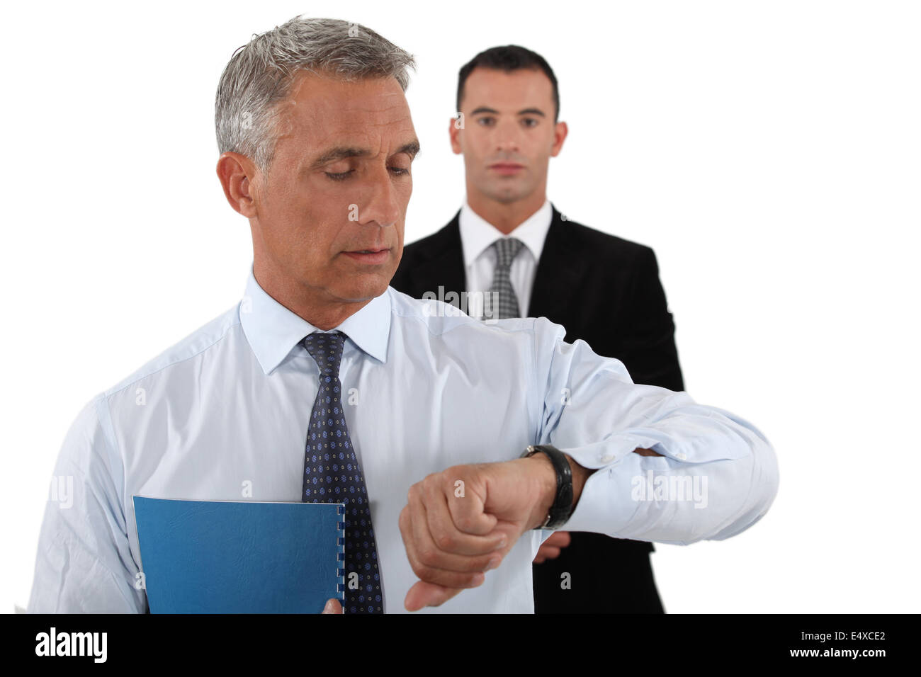 Due imprenditori impetuoso per soddisfare dead-line Foto Stock