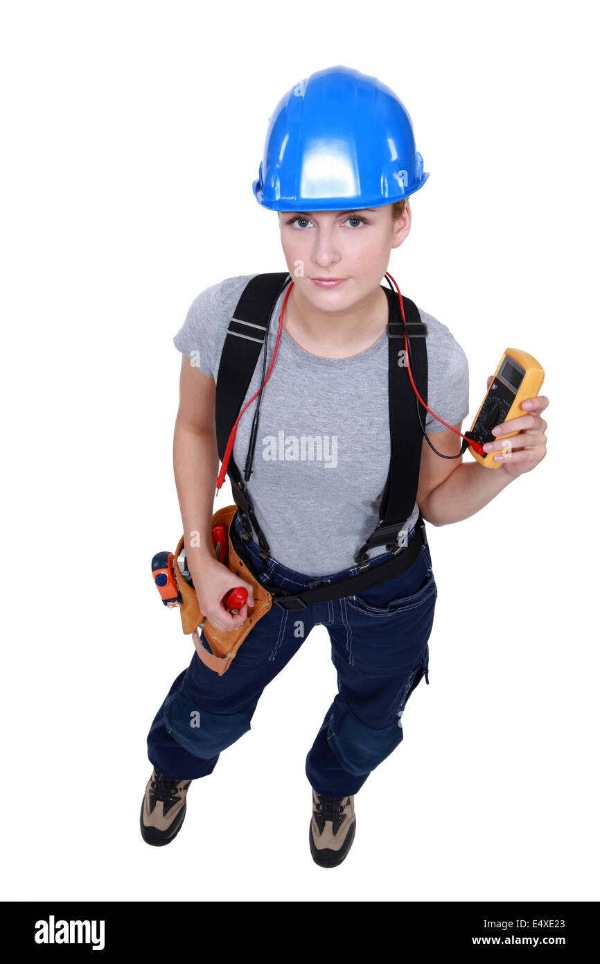 Elettricista femmina tenendo la lettura Foto Stock