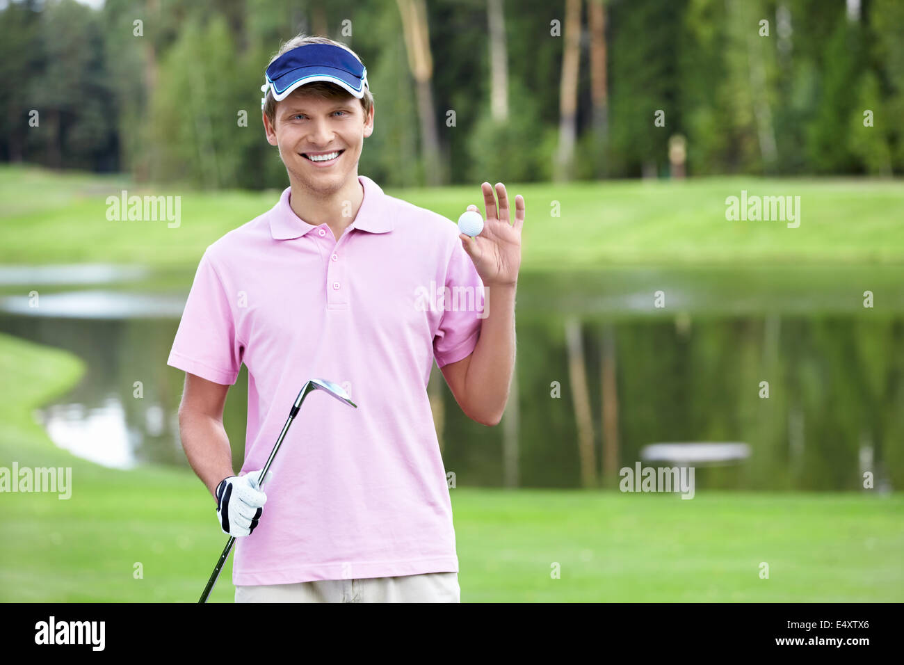 Giocatore di golf felice Foto Stock