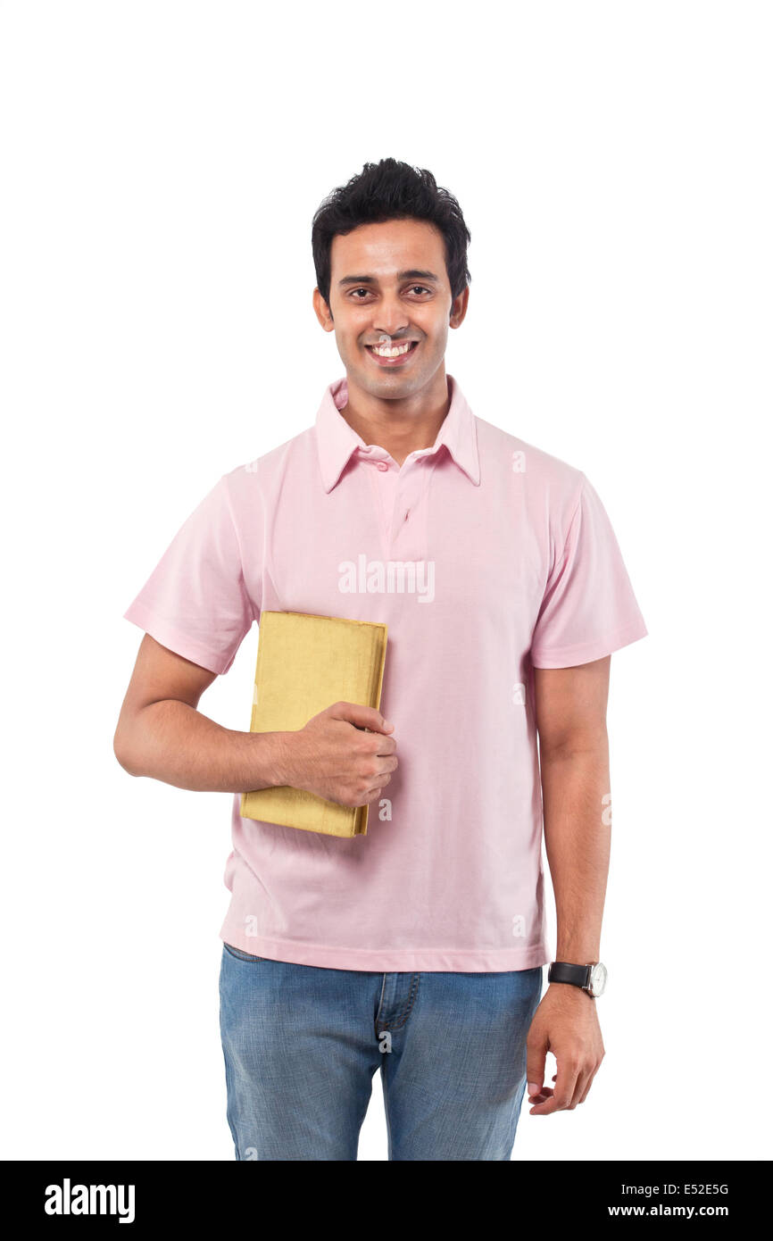 Ritratto di un giovane con un libro sorridente Foto Stock