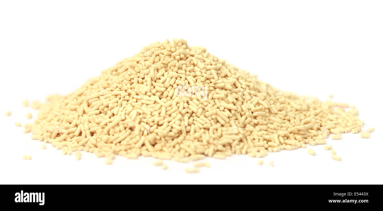 Il lievito su sfondo bianco Foto Stock