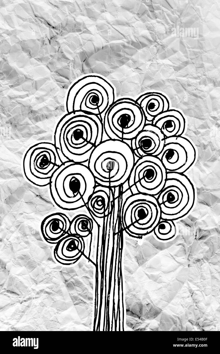 Set di alberi con foglie su carta sgualcita Foto Stock