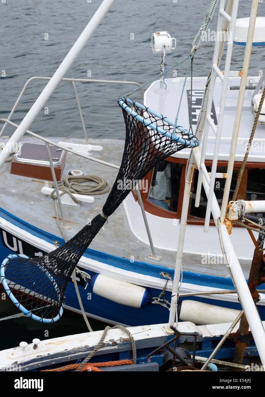 Uovo timer pezza di rete di forma indicante una nave da pesca a strascico Foto Stock