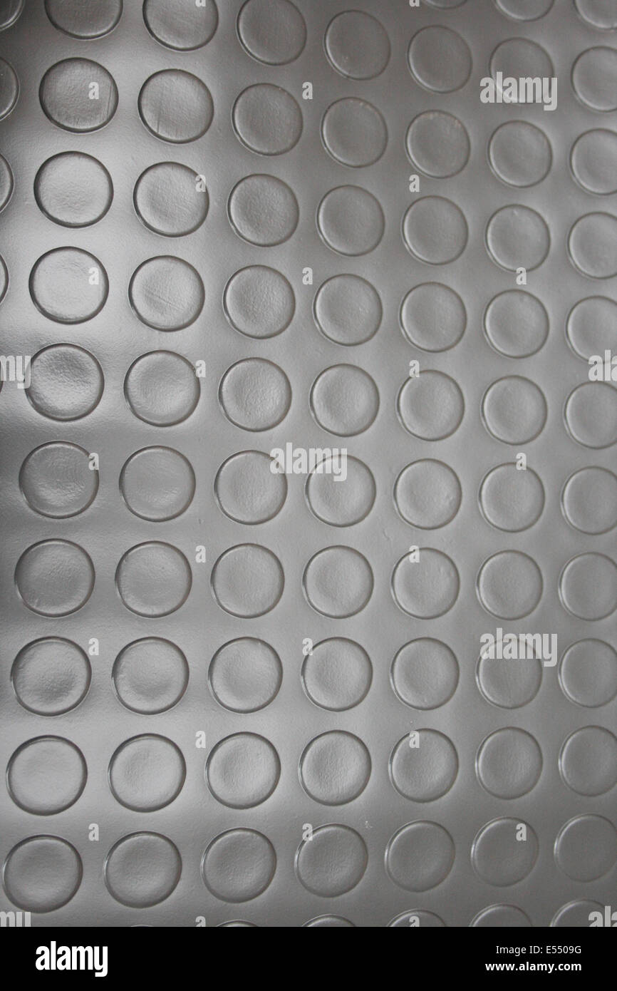 In acciaio inox treadplate con un modo un po' insolito disegno battistrada. Foto Stock