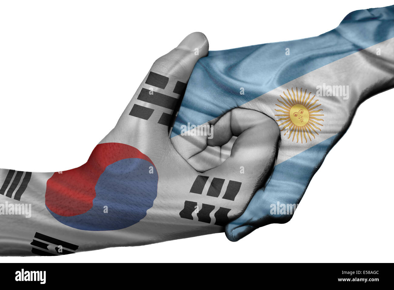 Handshake diplomatiche tra paesi: bandiere della Corea del Sud e Argentina sovradipinta le due mani Foto Stock