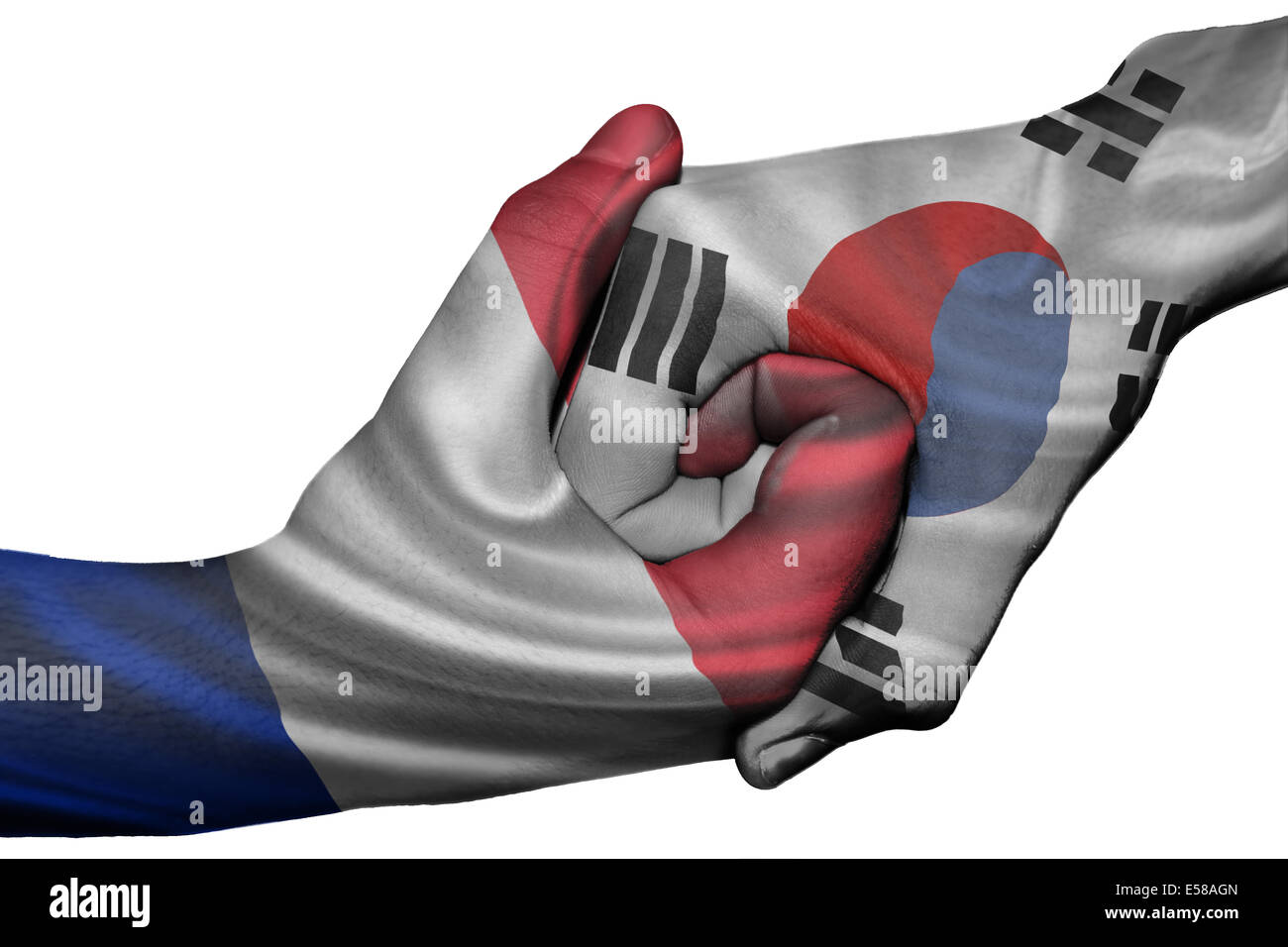 Handshake diplomatiche tra paesi: bandiere di Francia e Corea del Sud sovradipinta le due mani Foto Stock