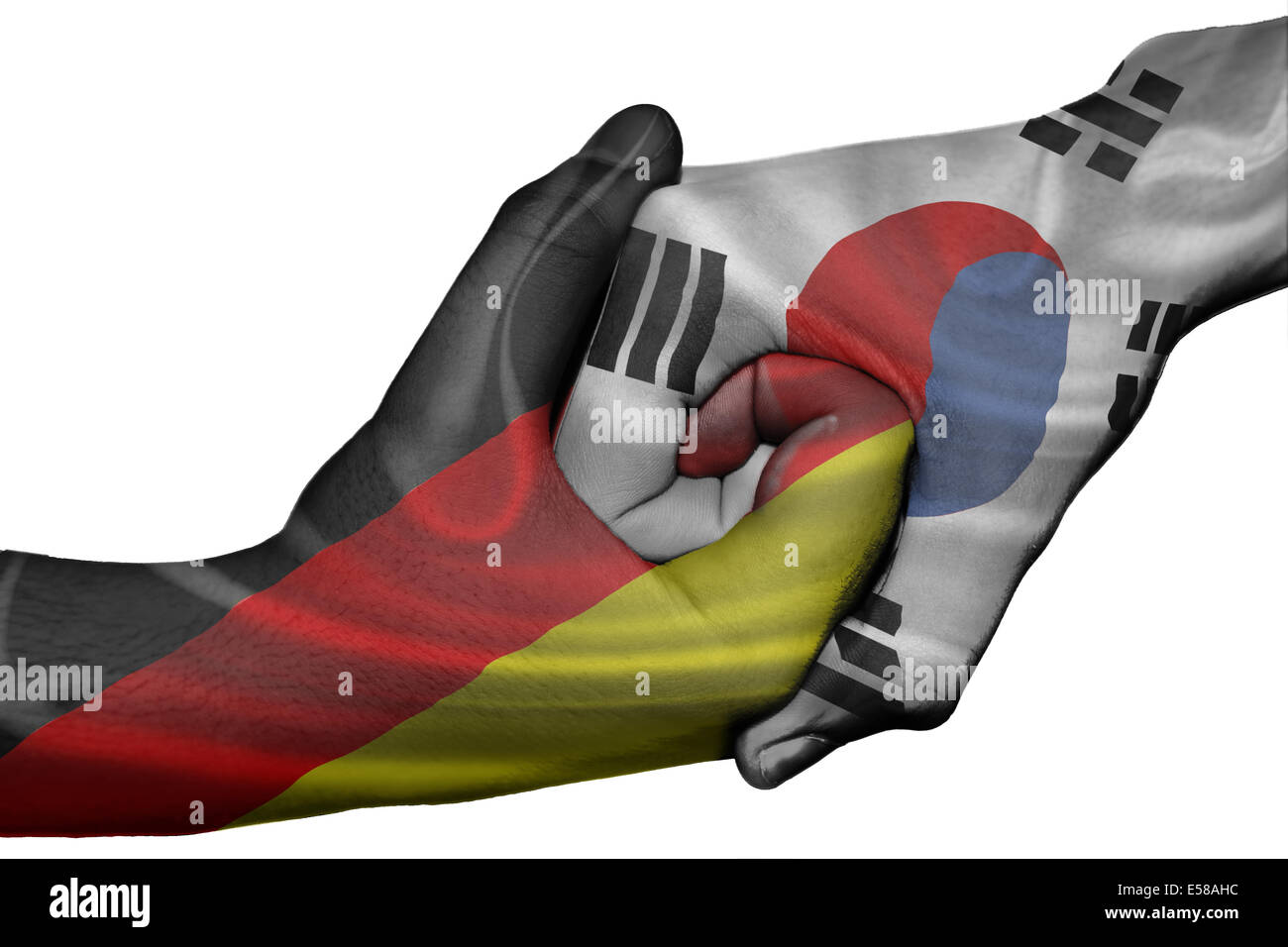 Handshake diplomatiche tra paesi: bandiere della Germania e della Corea del Sud sovradipinta le due mani Foto Stock