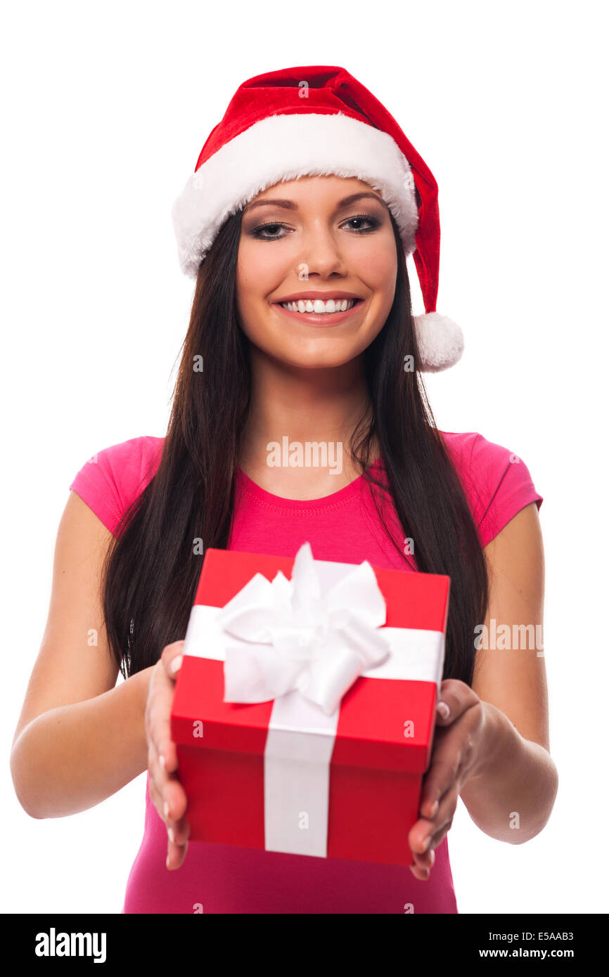 Carino donna con cappello da Babbo Natale dando un regalo di Natale,  Debica, Polonia Foto stock - Alamy