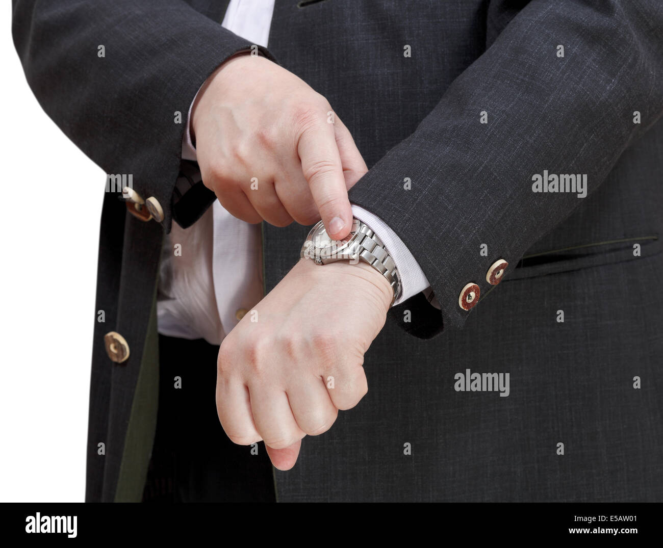 Imprenditore mostrano esattamente il tempo su un orologio da polso - mano gesto isolato su sfondo bianco Foto Stock