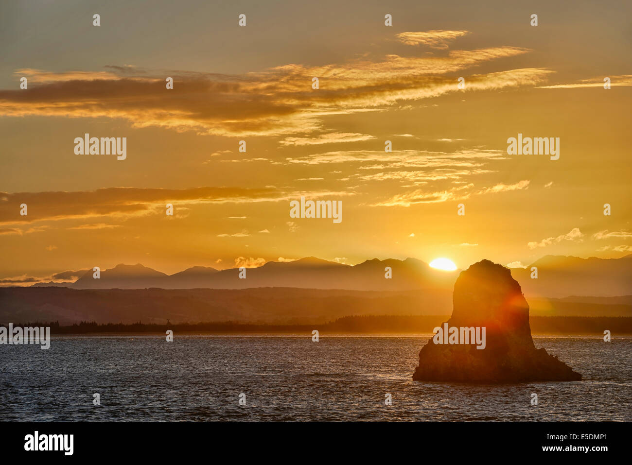 Nuova Zelanda, Isola del Sud, Nelson, tramonto sulla roccia a freccia Foto Stock